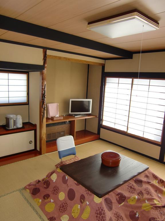 Отель Kikusuisou Annex Кусацу Номер фото