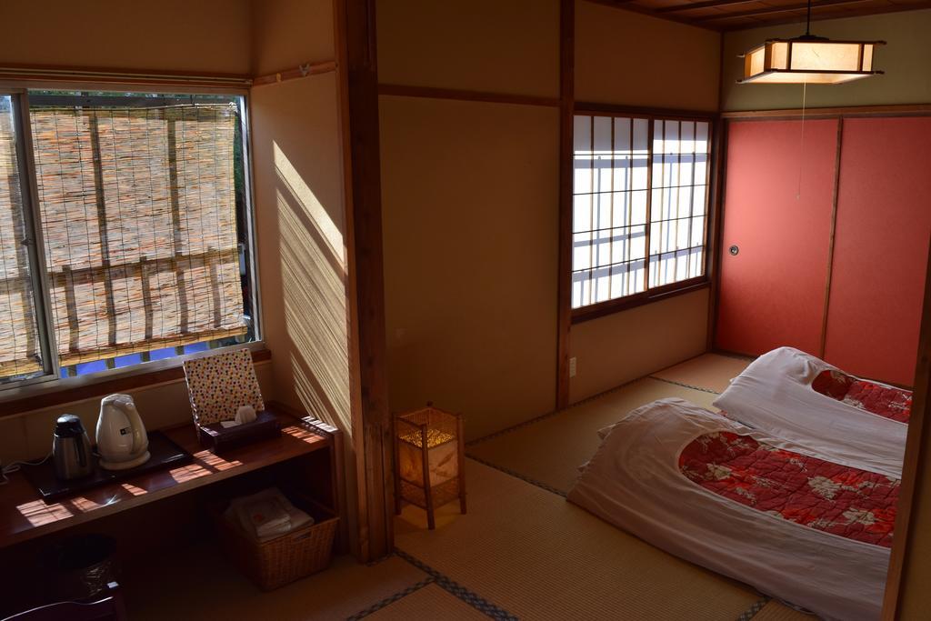 Отель Kikusuisou Annex Кусацу Номер фото